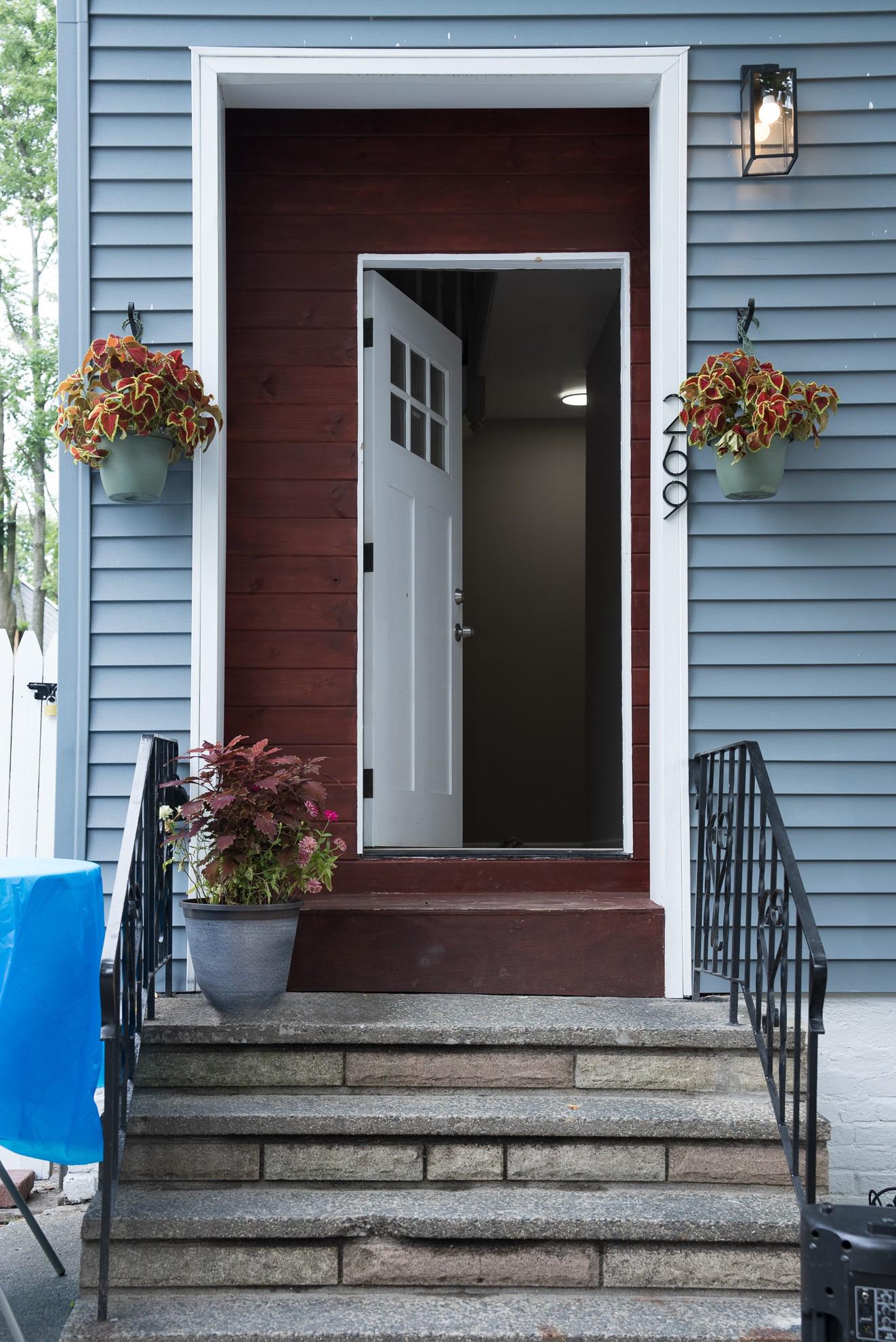 Open front door to home.